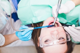 A Woman Having a Dental Care Treatment