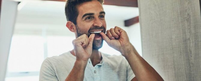 Can I floss my porcelain dental veneers