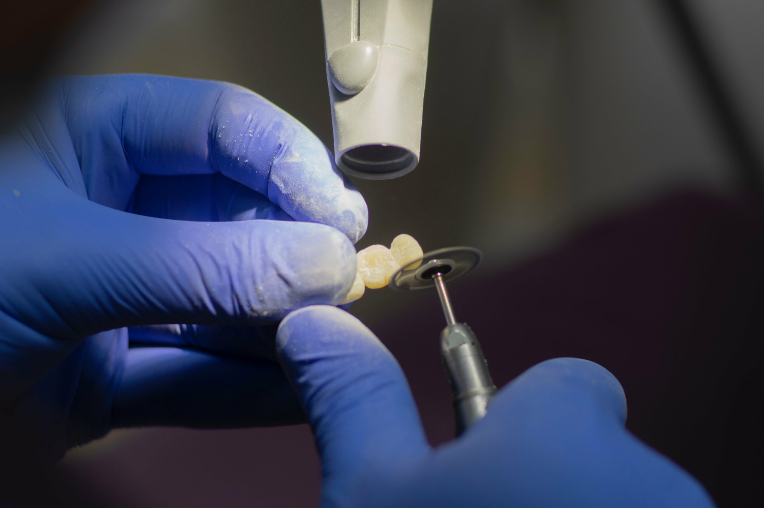 dentist grinding dental cap