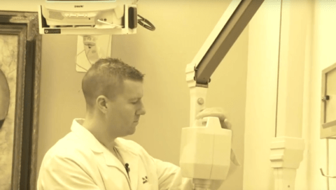 A Dentist working in Clinic